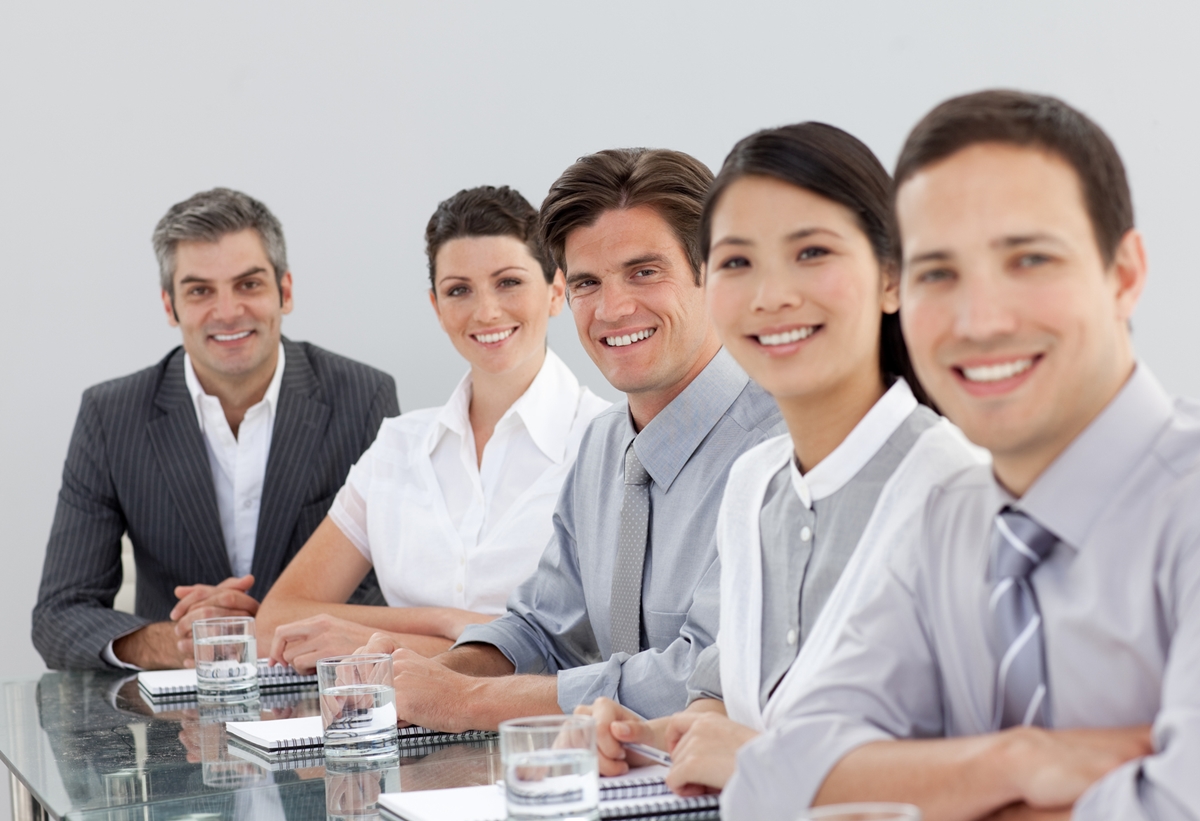 Smiling multi-ethnic business people in a meeting