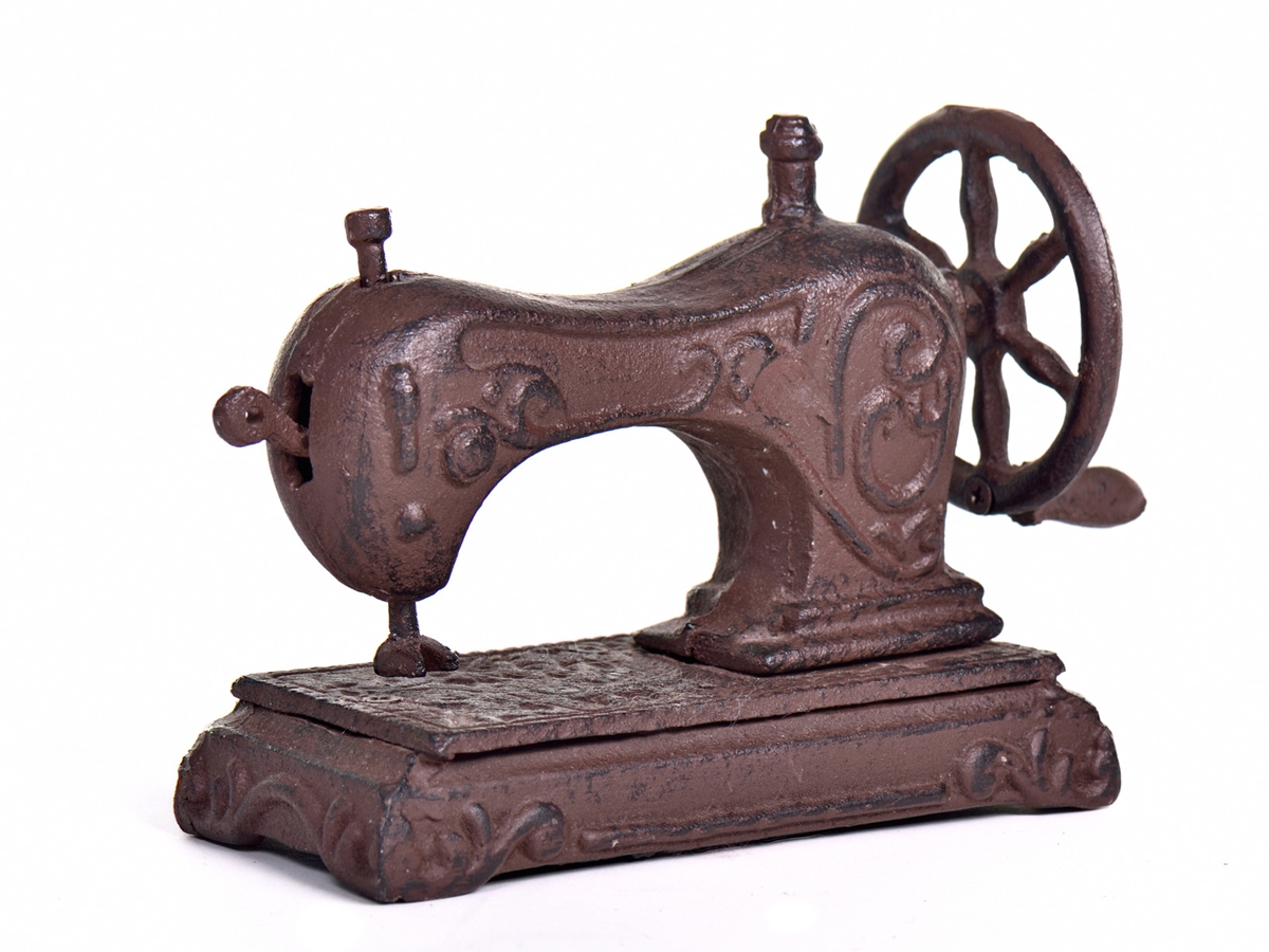 Antique sewing machine isolated